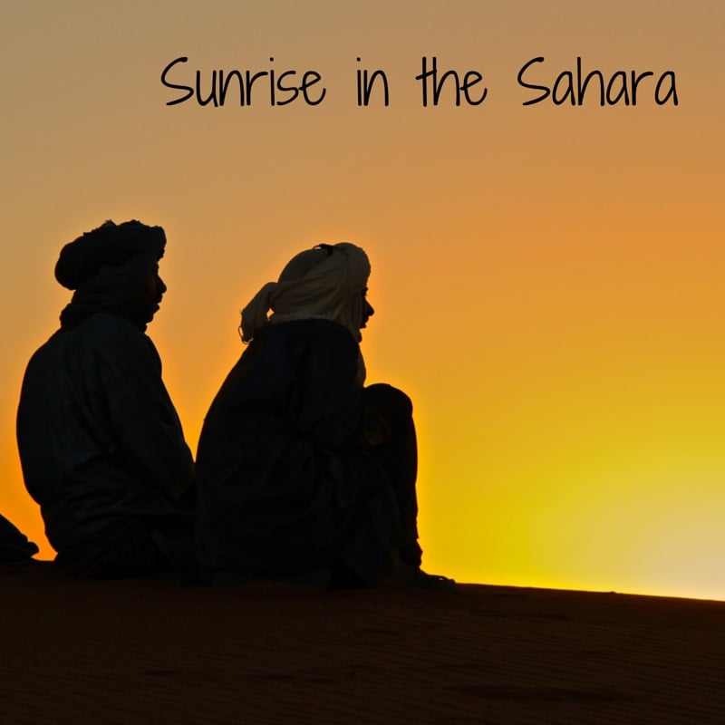Sunrise in the Sahara desert sand dunes